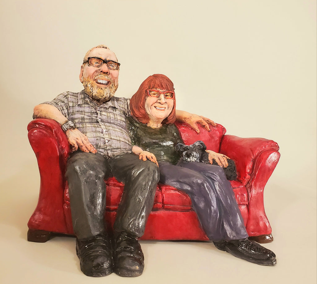 Couple on a red couch